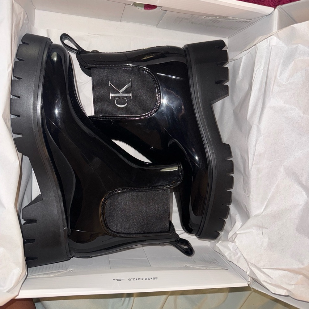 Calvin Klein Glossy Black Ankle Booties